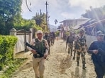 Security personnel conduct patrolling in a sensitive area of Manipur on Wednesday. (PTI) Security personnel conduct patrolling in a sensitive area of Manipur on Wednesday. (PTI)