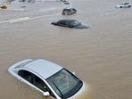 California Bomb Cyclone: Cars sit abandoned on roads as floodwaters from the Tule River inundate the area after days of heavy rain, in Corcoran, California.