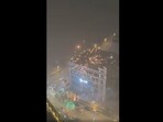 The firecrackers are shot into the sky and emit plumes of smoke, adding to the already hazardous air.