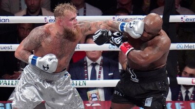 Jake Paul lands a left to Mike Tyson during their heavyweight boxing match on Friday, Nov. 15, 2024, in Arlington, Texas (AP)