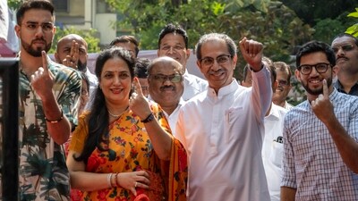 Shiv Sena (UBT) leader Uddhav Thackeray and his family pose after casting their vote at Bandra in Mumbai (Photo by Satish Bate/ Hindustan Times) Shiv Sena (UBT) leader Uddhav Thackeray and his family pose after casting their vote at Bandra in Mumbai (Photo by Satish Bate/ Hindustan Times)