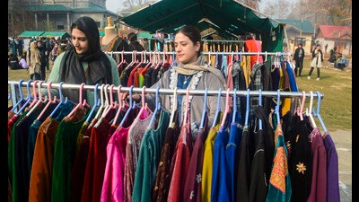 Locals purchase woolen clothers ahead of winter season in Srinagar. (PTI) Locals purchase woolen clothers ahead of winter season in Srinagar. (PTI)