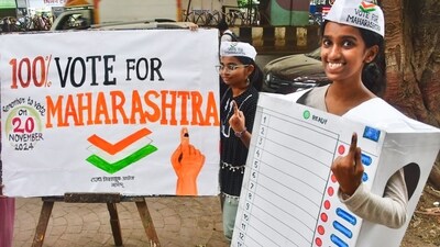 Students urge citizens to cast their votes in the Maharashtra assembly elections in Mumbai. (PTI Photo) Students urge citizens to cast their votes in the Maharashtra assembly elections in Mumbai. (PTI Photo)
