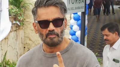 Actor Suniel Shetty shows his ink-marked finger after casting vote during the Maharashtra Assembly elections. (PTI) Actor Suniel Shetty shows his ink-marked finger after casting vote during the Maharashtra Assembly elections. (PTI)
