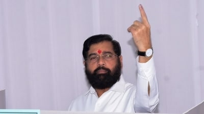 Maharashtra chief minister Eknath Shinde shows his ink-marked finger after casting his vote during the assembly elections in Thane. (PTI) Maharashtra chief minister Eknath Shinde shows his ink-marked finger after casting his vote during the assembly elections in Thane. (PTI)