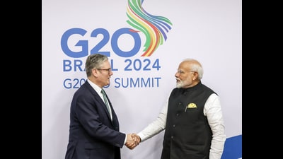 Prime Minister Narendra Modi with United Kingdom counterpart Keir Starmer on the sidelines of the G20 summit in Rio de Janeiro on Monday. (ANI Photo) Prime Minister Narendra Modi with United Kingdom counterpart Keir Starmer on the sidelines of the G20 summit in Rio de Janeiro on Monday. (ANI Photo)