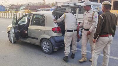 Security personnel check a vehicle in a sensitive area of Manipur on Wednesday. (PTI) Security personnel check a vehicle in a sensitive area of Manipur on Wednesday. (PTI)