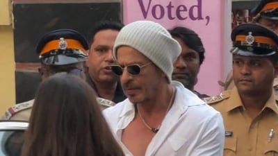 Shah Rukh Khan didn't pose for the cameras when he stepped out to cast his vote in Mumbai on Wednesday. Shah Rukh Khan didn't pose for the cameras when he stepped out to cast his vote in Mumbai on Wednesday.