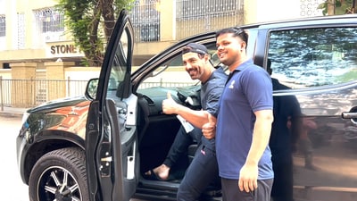 John Abraham poses for selfies after casting vote. John Abraham poses for selfies after casting vote.