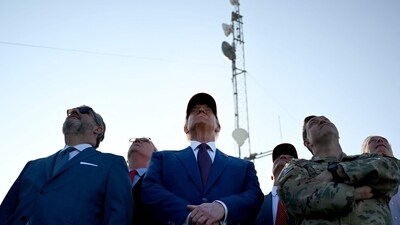 US President-elect Donald Trump (C) attends the launch of the sixth test flight of the SpaceX Starship rocket on November 19, 2024 in Brownsville, Texas. SpaceX's billionaire owner, Elon Musk, a Trump confidante, has been tapped to lead the new Department of Government Efficiency alongside former presidential candidate Vivek Ramaswamy. (Getty Images via AFP) US President-elect Donald Trump (C) attends the launch of the sixth test flight of the SpaceX Starship rocket on November 19, 2024 in Brownsville, Texas. SpaceX's billionaire owner, Elon Musk, a Trump confidante, has been tapped to lead the new Department of Government Efficiency alongside former presidential candidate Vivek Ramaswamy. (Getty Images via AFP)