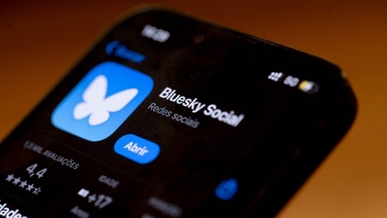 In this photo illustration, the Bluesky Social logo is displayed on a cell phone in Rio de Janeiro, Brazil, on September 4, 2024 (Mauro Pimtel/AFP)
