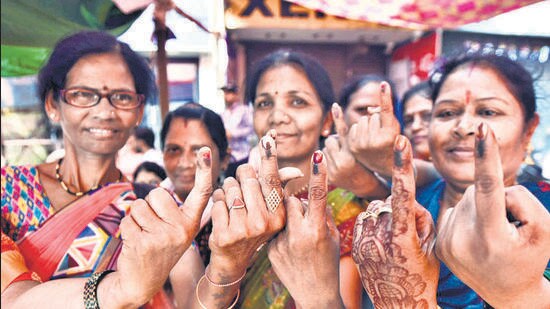 Since early morning Wednesday, polling stations were abuzz with women of all ages, clad in colourful saris and exuding a sense of determination. (MAHENDRA KOLHE/HT PHOTO)