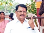 Leader of Opposition in the Maharashtra Legislative Assembly and Congress leader Vijay Wadettiwar shows his ink-marked finger after casting his vote. (ANI Photo)
