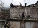 Firefighters work at the site of a Russian missile strike, amid Russia's attack on Ukraine, in Dnipro, Ukraine November 21, 2024. 