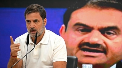 Congress leader Rahul Gandhi addresses a press conference against the backdrop of a picture of industrialist Gautam Adani, at his party headquarters in New Delhi on November 21. (AFP) (AFP) Congress leader Rahul Gandhi addresses a press conference against the backdrop of a picture of industrialist Gautam Adani, at his party headquarters in New Delhi on November 21. (AFP) (AFP)
