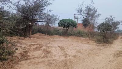 The spot where MCG had allegedly been dumping garbage and debris from Gurgaon-Faridabad highway into the Baliawas village. (Parveen Kumar/HT Photo) The spot where MCG had allegedly been dumping garbage and debris from Gurgaon-Faridabad highway into the Baliawas village. (Parveen Kumar/HT Photo)