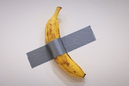 Italian visual artist Maurizio Cattelan's duct-taped Banana titled "Comedian" is on display at Sotheby's in New York. (AFP) Italian visual artist Maurizio Cattelan's duct-taped Banana titled "Comedian" is on display at Sotheby's in New York. (AFP)