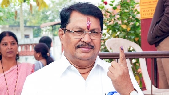 Leader of Opposition in the Maharashtra Legislative Assembly and Congress leader Vijay Wadettiwar shows his ink-marked finger after casting his vote. (ANI Photo) (Chandrakant Paddhane)