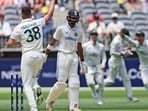 Australia's Josh Hazlewood celebrates the wicket of India's Devdutt Padikkal. Australia's Josh Hazlewood celebrates the wicket of India's Devdutt Padikkal.