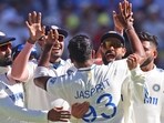 India's captain Jasprit Bumrah, back to the camera celebrates with teammates, Nov. 22, 2024. (AP Photo/Trevor Collens) India's captain Jasprit Bumrah, back to the camera celebrates with teammates, Nov. 22, 2024. (AP Photo/Trevor Collens)