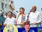 NCP-SCP chief Sharad Pawar with party candidate from Thane, Jitendra Awhad during his nomination rally for the Maharashtra Assembly elections, in Thane. NCP-SCP chief Sharad Pawar with party candidate from Thane, Jitendra Awhad during his nomination rally for the Maharashtra Assembly elections, in Thane.
