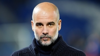 Pep Guardiola has signed a new contract with Manchester City (Adam Davy/PA)
