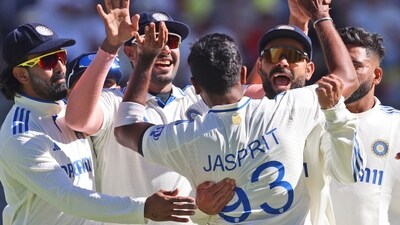 India's captain Jasprit Bumrah, back to the camera celebrates with teammates, Nov. 22, 2024. (AP Photo/Trevor Collens) (AP) India's captain Jasprit Bumrah, back to the camera celebrates with teammates, Nov. 22, 2024. (AP Photo/Trevor Collens) (AP)