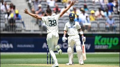 Australia's Josh Hazlewood celebrates after taking the wicket of India's Virat Kohli in Perth on Friday. (AAP Image via REUTERS) Australia's Josh Hazlewood celebrates after taking the wicket of India's Virat Kohli in Perth on Friday. (AAP Image via REUTERS)