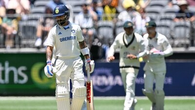 India's Virat Kohli walks back to the pavilion after his dismissal by Australia's paceman Josh Hazlewood during the first day of the first Test (AFP) India's Virat Kohli walks back to the pavilion after his dismissal by Australia's paceman Josh Hazlewood during the first day of the first Test (AFP)
