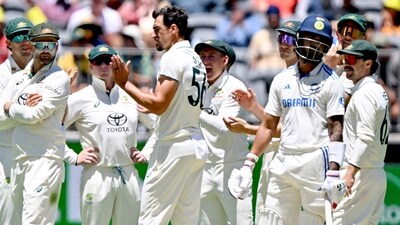 Australia's paceman Mitchell Starc (C) celebrates the wicket of India's KL Rahul. (Photo by SAEED KHAN / AFP) (AFP) Australia's paceman Mitchell Starc (C) celebrates the wicket of India's KL Rahul. (Photo by SAEED KHAN / AFP) (AFP)