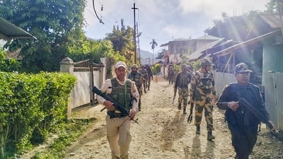 Security personnel conduct patrolling in a sensitive area of Manipur on Wednesday. (PTI) Security personnel conduct patrolling in a sensitive area of Manipur on Wednesday. (PTI)