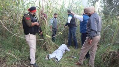 One of the two injured gangsters following a shootout with the police on the outskirts of Pholriwal village in Jalandhar on Friday. (HT Photo) One of the two injured gangsters following a shootout with the police on the outskirts of Pholriwal village in Jalandhar on Friday. (HT Photo)
