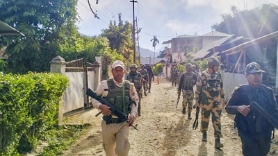 Security personnel conduct patrolling in a sensitive area of Manipur. (PTI) Security personnel conduct patrolling in a sensitive area of Manipur. (PTI)