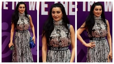 Shalini Passi opted for a stunning halter neck gown with sketched illustrations as the print. For a pop of colour, she carried a blue bag with a neutral gown. Keeping her look elegant without any accessories, Shalini dazzled in this outfit. (PC: Ashutosh Rai) Shalini Passi opted for a stunning halter neck gown with sketched illustrations as the print. For a pop of colour, she carried a blue bag with a neutral gown. Keeping her look elegant without any accessories, Shalini dazzled in this outfit. (PC: Ashutosh Rai)