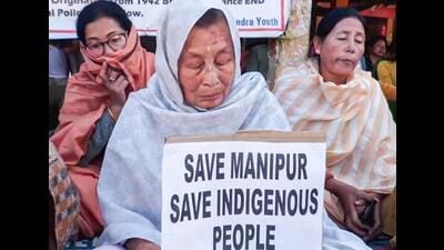 Women from Lamlai village and Chalou village stage a sit-in protest in Imphal East against the violence and tension in Manipur. (ANI Photo)