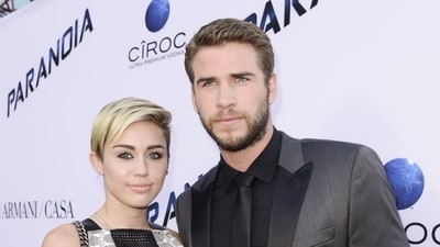 In this file photo, actor Liam Hemsworth and singer and actress Miley Cyrus arrive on the red carpet at the US premiere of the feature film Paranoia at the DGA Theatre in Los Angeles. (AP) In this file photo, actor Liam Hemsworth and singer and actress Miley Cyrus arrive on the red carpet at the US premiere of the feature film Paranoia at the DGA Theatre in Los Angeles. (AP)
