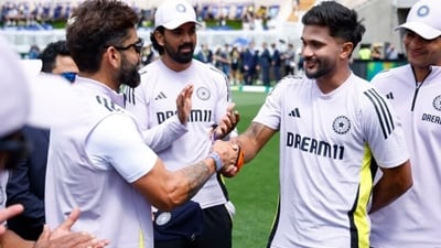 Nitish Kumar Reddy received his Test cap from Virat Kohli. (BCCI) Nitish Kumar Reddy received his Test cap from Virat Kohli. (BCCI)