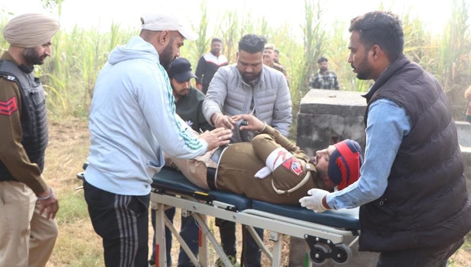One of the two police personnel injured in the shootout in Jalandhar district on Friday. (HT Photo) One of the two police personnel injured in the shootout in Jalandhar district on Friday. (HT Photo)