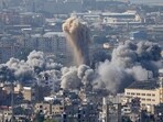 Smoke rises between buildings hit by an Israeli airstrike in Dahiyeh, the southern suburb of Beirut, Lebanon, Thursday, Nov. 14, 2024. (AP Photo/Hussein Malla) Smoke rises between buildings hit by an Israeli airstrike in Dahiyeh, the southern suburb of Beirut, Lebanon, Thursday, Nov. 14, 2024. (AP Photo/Hussein Malla)