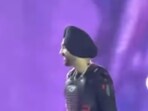 Diljit Dosanjh meets a fan on stage for a special moment. Diljit Dosanjh meets a fan on stage for a special moment.