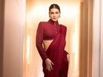 Kriti Sanon's red saree is perfect for formal events. Kriti Sanon's red saree is perfect for formal events.