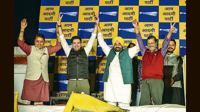 (From left) AAP’s Punjab chief Aman Arora, Rajya Sabha member Raghav Chadha, CM Bhagwant Mann and AAP convener Arvind Kejriwal during an event to celebrate bypoll victories, in New Delhi on Saturday. (PTI)