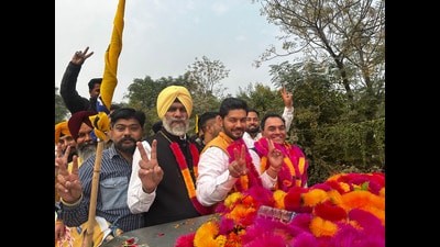 AAP’s Ishank Kumar and his MP father Raj Kumar during a roadshow in Chabbewal byelection. (HT) AAP’s Ishank Kumar and his MP father Raj Kumar during a roadshow in Chabbewal byelection. (HT)