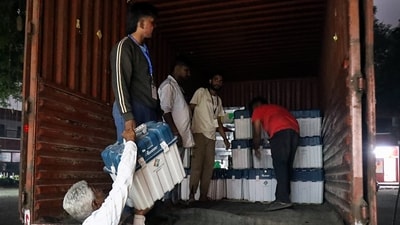 Maharashtra assembly election results: Electronic Voting Machines (EVM) being brought to a counting centre from a strong room. (ANI) Maharashtra assembly election results: Electronic Voting Machines (EVM) being brought to a counting centre from a strong room. (ANI)
