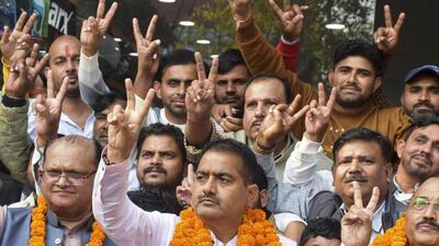 BJP candidate Ramveer Singh Thakur, along with his supporters, shows the victory sign after winning the Kundarki assembly bypoll, in Moradabad on Saturday. (PTI PHOTO) BJP candidate Ramveer Singh Thakur, along with his supporters, shows the victory sign after winning the Kundarki assembly bypoll, in Moradabad on Saturday. (PTI PHOTO)