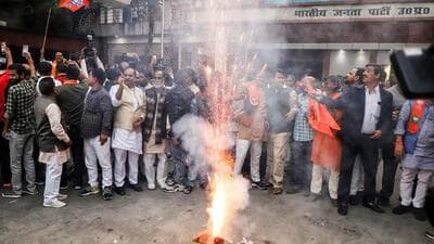 BJP supporters celebrate at party office in Lucknow on Saturday. (ANI PHOTO) BJP supporters celebrate at party office in Lucknow on Saturday. (ANI PHOTO)