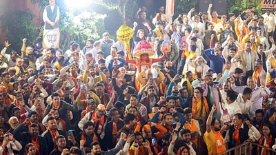 BJP supporters celebrate the party's victory in the Maharashtra assembly election, at party headquarters in New Delhi. (ANI) BJP supporters celebrate the party's victory in the Maharashtra assembly election, at party headquarters in New Delhi. (ANI)