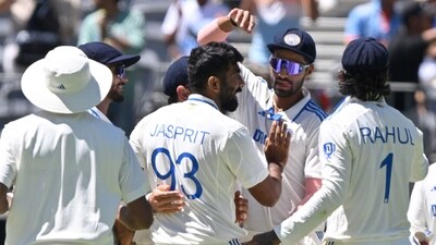 India's Jasprit Bumrah (C) celebrates his wicket of Australia's Alex Carey with teammates on day two of the Perth Test (AFP)