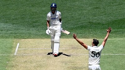 Australia's paceman Mitchell Starc celebrates after dismissing KL Rahul. (Photo by SAEED KHAN / AFP) (AFP) Australia's paceman Mitchell Starc celebrates after dismissing KL Rahul. (Photo by SAEED KHAN / AFP) (AFP)