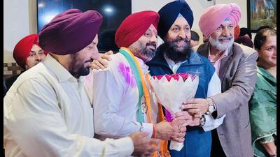 Congress’ Kuldeep Singh Dhillon (left) with party leaders Partap Singh Bajwa and Balbir Singh Sidhu after the win. (Sourced)
